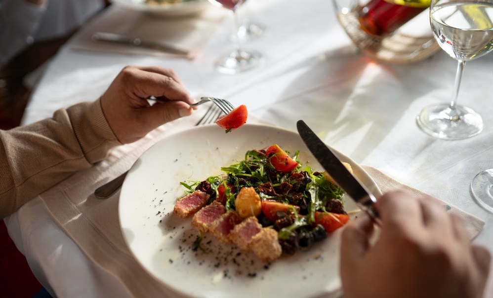 Man having a luxurious meal at a restaurant close-up